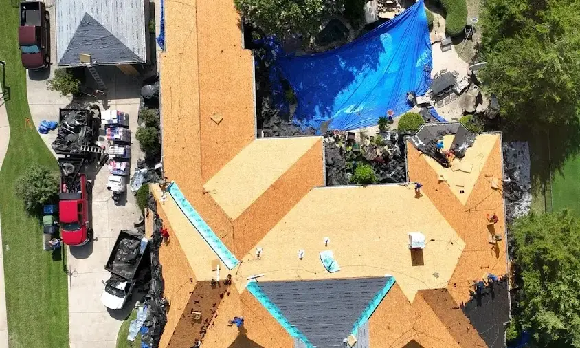 Professional Storm Damage Roof Repair being performed in Northlake