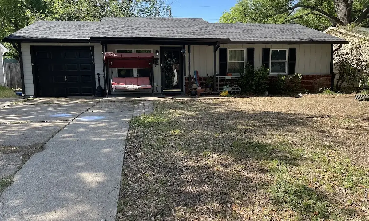 Asphalt Shingle Roof Repair crew at work on a residential roof in Northlake